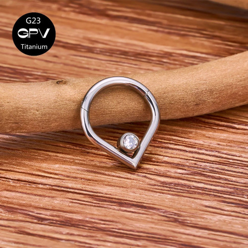 Кольцо-капля сегментное 1,2 мм кликер с кристаллом. Титан. HSEGTAJ009